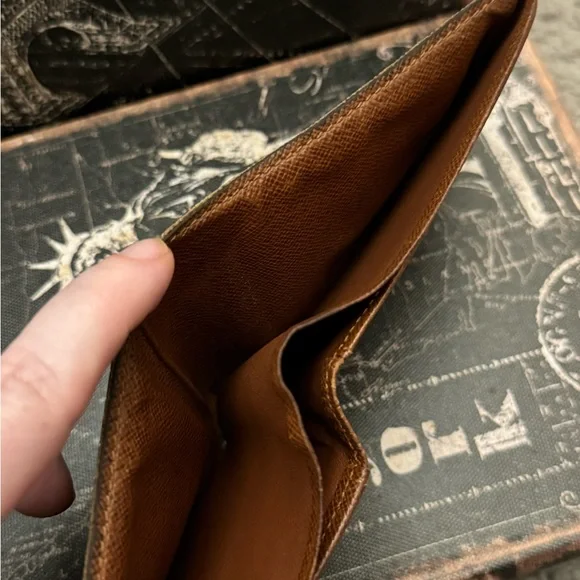 Louis Vuitton men’s multiple monogram wallet.